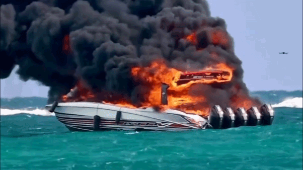 Dramatic video captures tourist boat engulfed in flames as passengers scramble to escape burning vessel