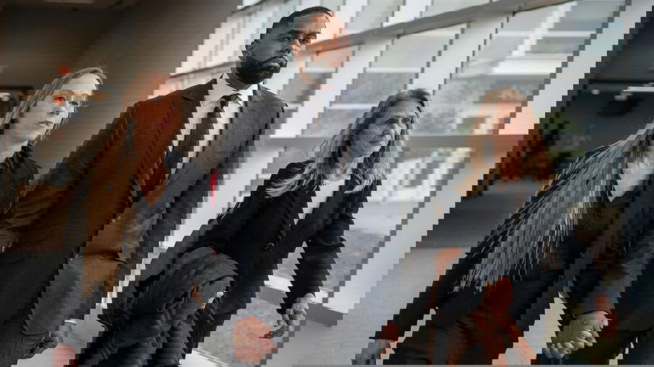 Ex-Michigan football coach Sherrone Moore walks into court hand in hand with wife ahead of latest hearing