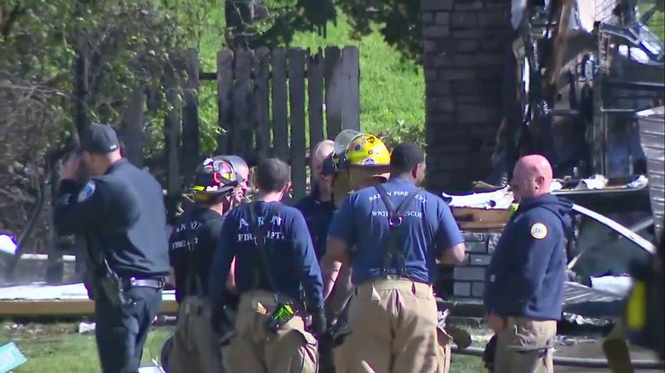 Small plane crashes into Ohio home killing 2 on board, igniting blaze in residential area